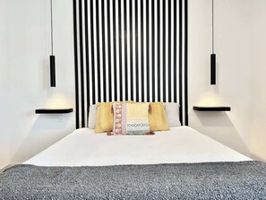 1 bedroom, desk, iron/ironing board, travel crib