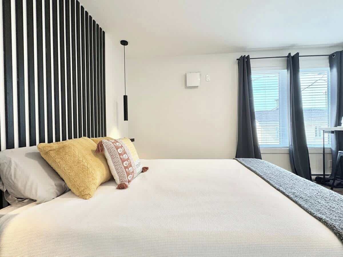 1 bedroom, desk, iron/ironing board, travel crib