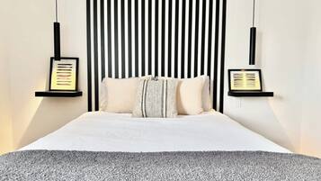 1 bedroom, desk, iron/ironing board, travel crib