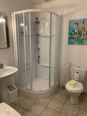 Shower, hair dryer, towels, soap