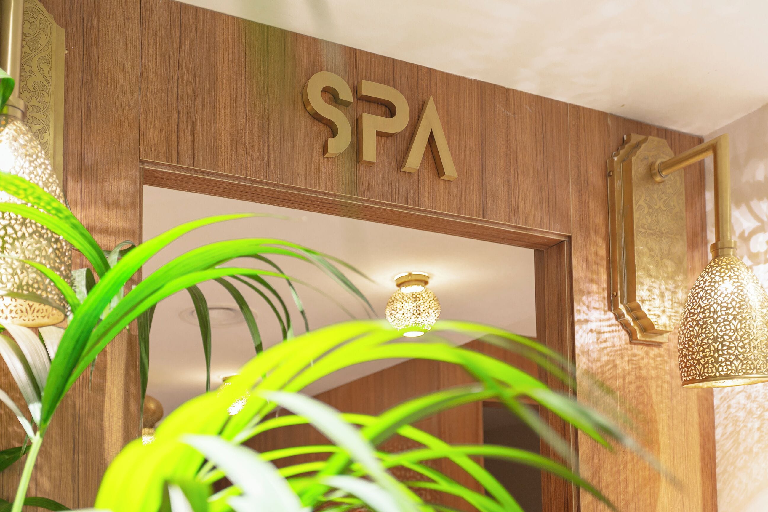 A spa area with wooden paneling and a sign that reads "SPA".