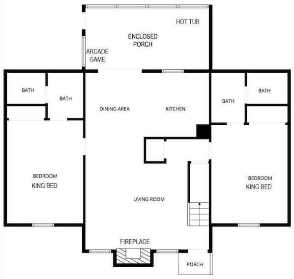 A floor plan with a king bed, two bathrooms, a dining area, kitchen, living room, fireplace, and an arcade game.