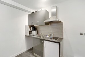 Microwave, stovetop, coffee/tea maker, toaster