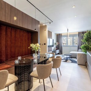 Family Apartment, Balcony, City View | Desk, laptop workspace, blackout drapes, soundproofing