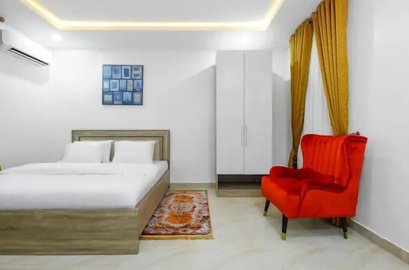 Family Apartment, Balcony, City View | Desk, laptop workspace, blackout drapes, soundproofing