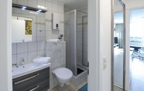 Shower, towels, toilet paper