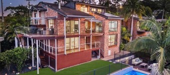 Coastal Luxury 2BR w Pool & Entertainer's Paradise