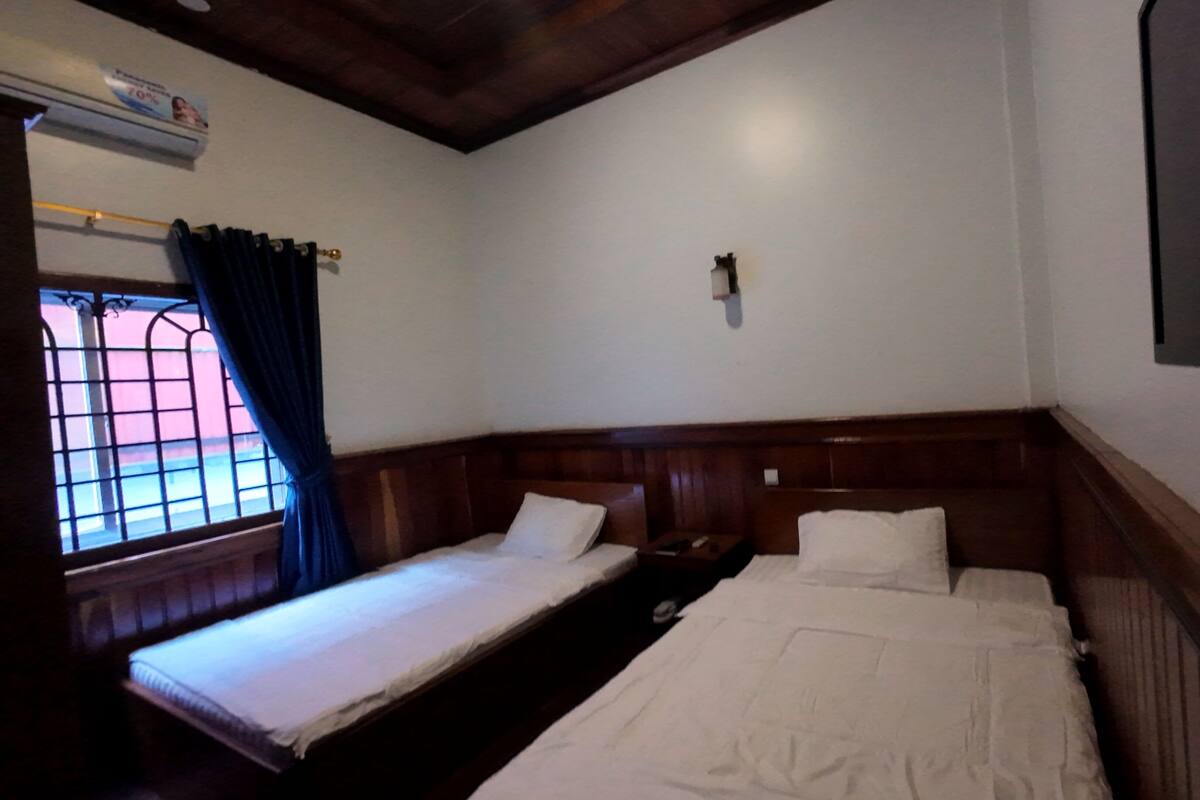 Chambre Deluxe avec lits jumeaux, 2 lits doubles | Coffres-forts dans les chambres, Wi-Fi gratuit
