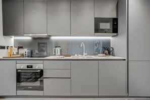 Apartment (1 Bedroom) | Private kitchen | Fridge, microwave, dishwasher, rice cooker