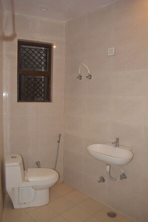 Habitación cuádruple Deluxe | Baño