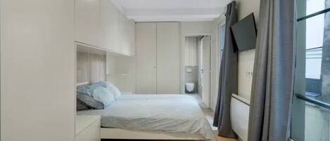 1 slaapkamer, een strijkplank/strijkijzer, wifi, beddengoed