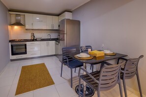 Fridge, coffee/tea maker, electric kettle, toaster