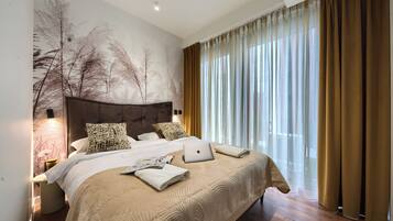 Deluxe Suite, City View | Laptop workspace, blackout curtains, iron/ironing board, free WiFi