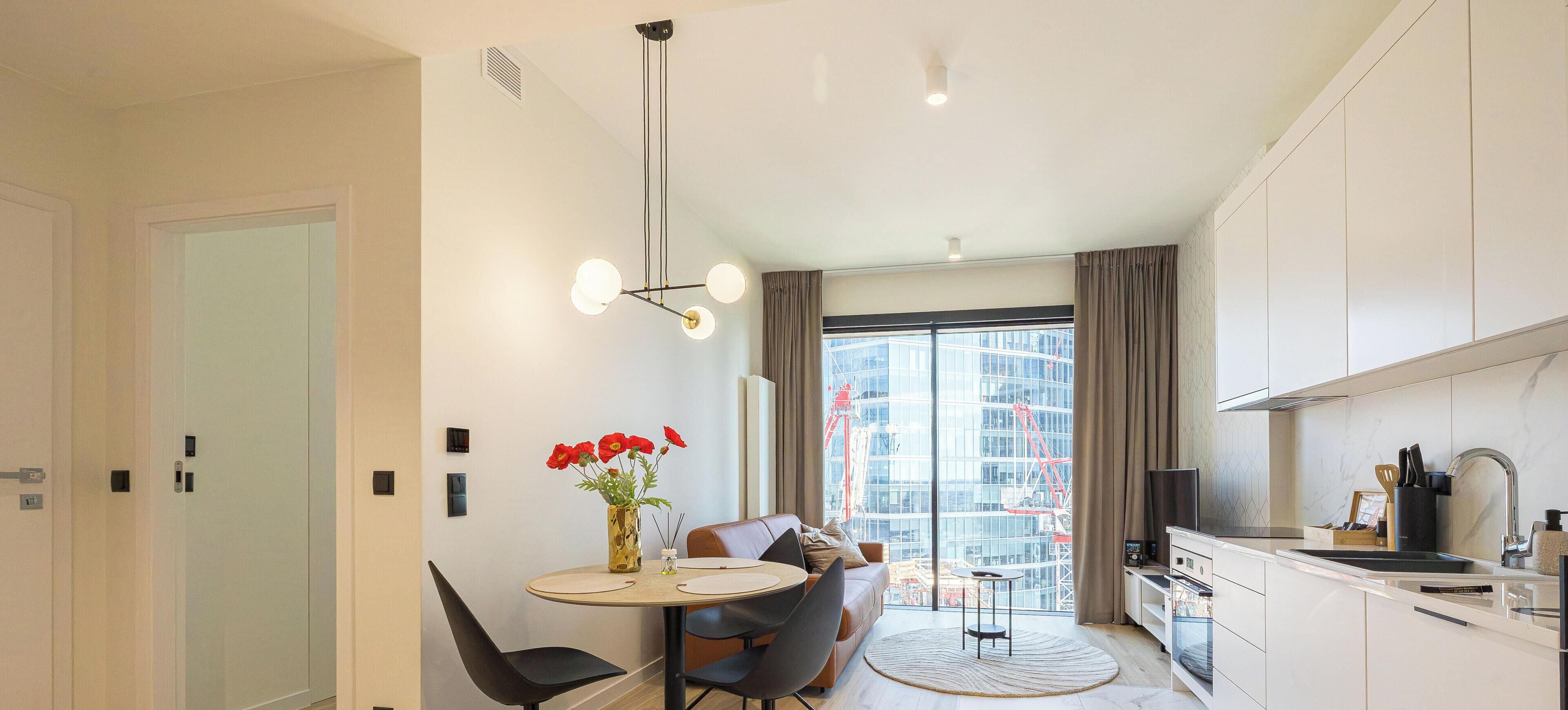 Apartamento superior, vista para a cidade | Área de estar