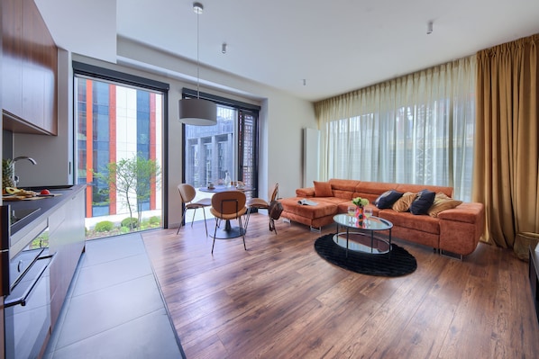 Deluxe Suite, City View | Laptop workspace, blackout drapes, iron/ironing board, free WiFi