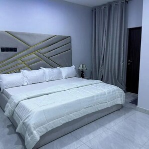 Economy Apartment, Balcony, City View | Desk, laptop workspace, blackout drapes, soundproofing - Residex Apartment (Abuja)