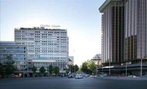 A multi-story building with the sign "CENTRO COLON" at the top.