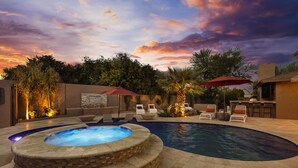 A swimming pool with a hot tub, lounge chairs, and a bar area. - Chaparral in Paradise Valley (Paradise Valley)