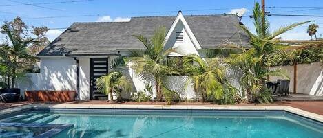 Outdoor pool, pool umbrellas, pool loungers