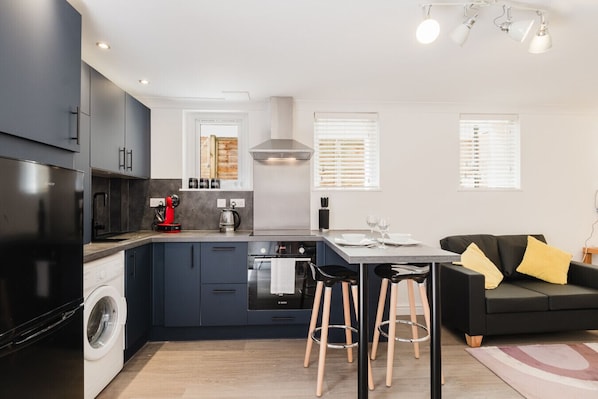 Fridge, oven, coffee/tea maker, toaster