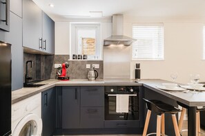 Fridge, oven, coffee/tea maker, toaster