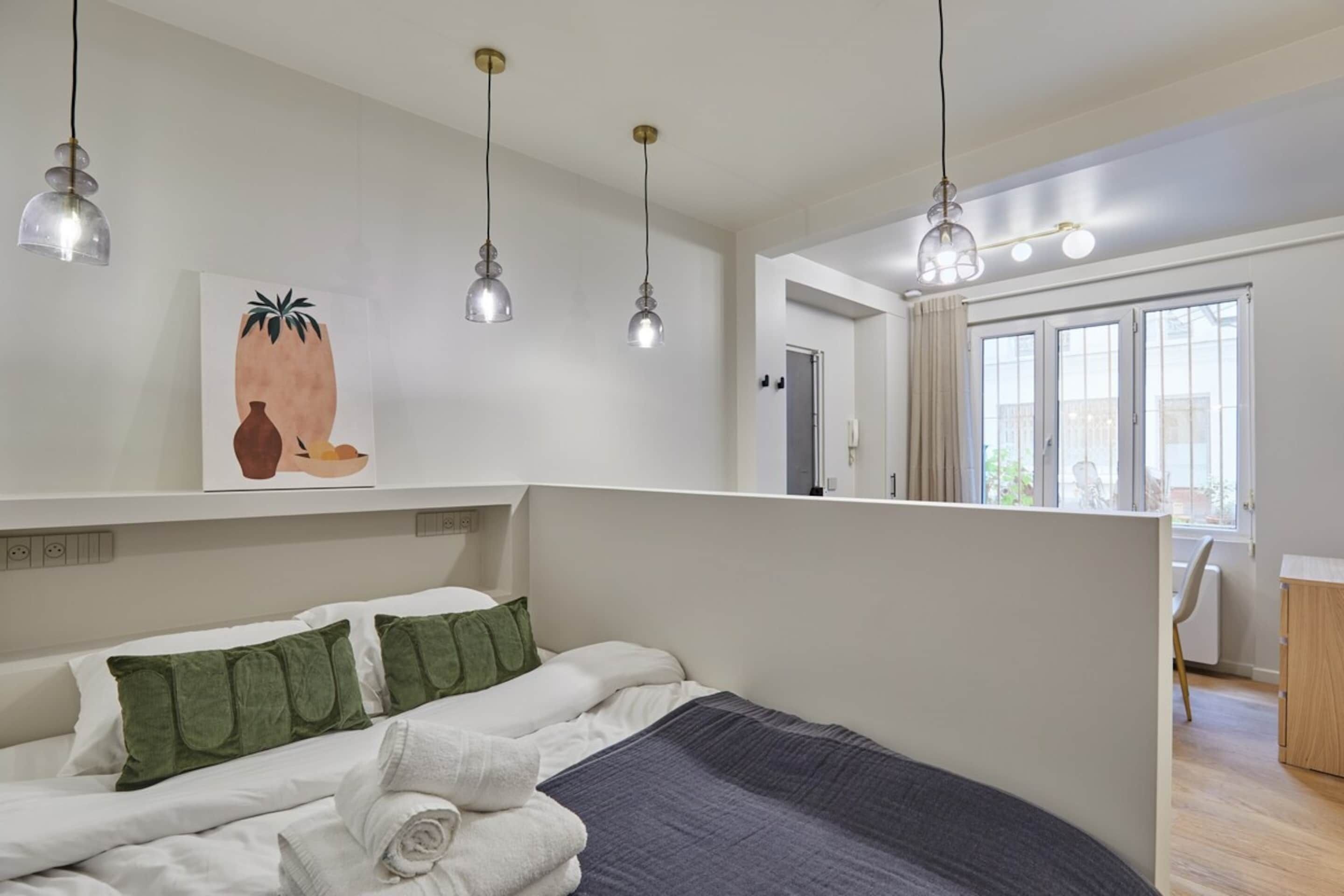 Apartment | Laptop workspace, iron/ironing board, bed sheets