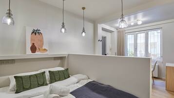 Apartment | Laptop workspace, iron/ironing board, bed sheets