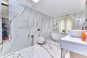 Shower, hair dryer, towels, soap