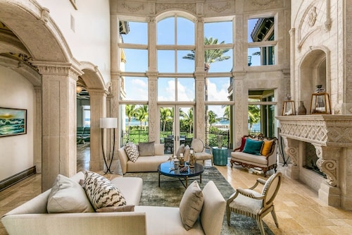Luxurious 3-story Estate With Gym Pool Slide Private Beach and Lighthouse Views
