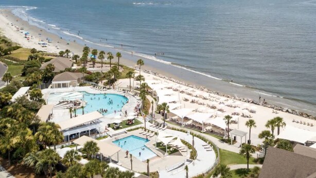 A resort with a large pool area, beach access, and ocean views. - The Breeze in Seabrook Island (Seabrook Island)