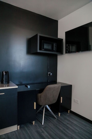 Apartamento Deluxe | Zona de estar