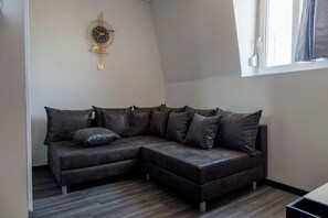 Apartamento luxo | Banheiro | Banheira, secador de cabelo, toalhas de banho, sabonete