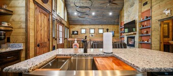 The Adirondack Hottub Shuffleboard Fireplace Foosball Table Arcade