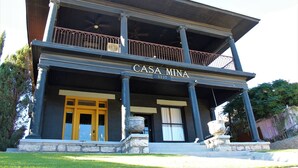 A two-story building with a balcony, columns, and a sign reading "CASA MINA". - Casa Mina 4 Central Rio Grande Historic District (El Paso)