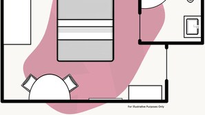 A floor plan of a hotel room with a bed, a desk, a chair, a toilet, and a small bathroom.