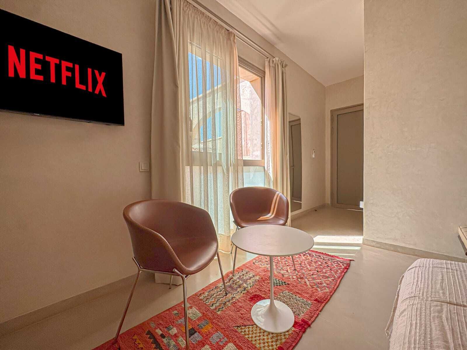 Deluxe Double Room, Multiple Beds | Courtyard view