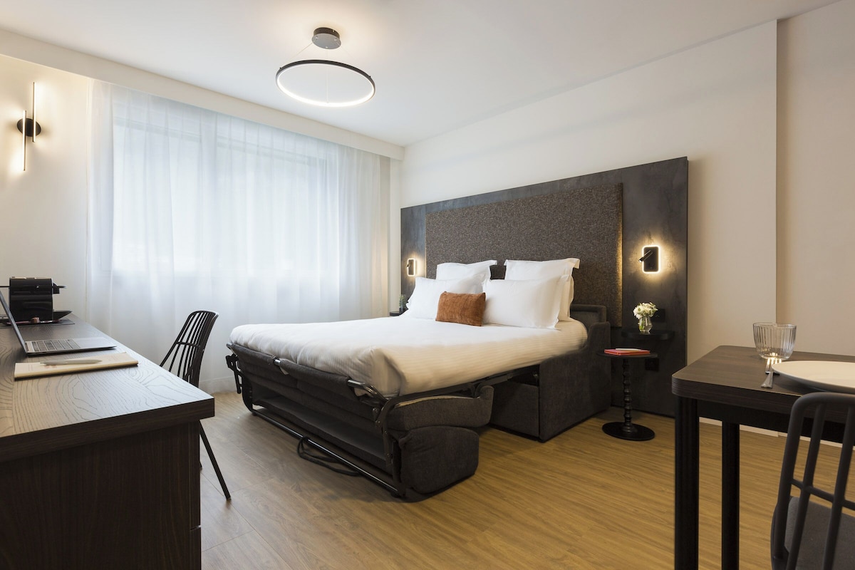 In-room safe, desk, laptop workspace, blackout curtains