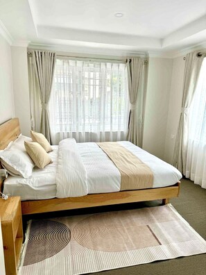 2 عدّة غرف نوم ومكواة/لوح كي وواي فاي مجانًا وملاءات أسرّة