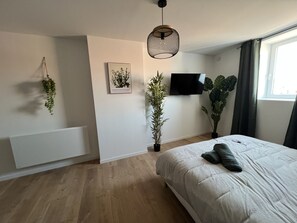 1 chambre, fer et planche à repasser, accès au Wi-Fi (inclus)