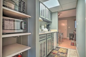 Fridge, microwave, stovetop, coffee/tea maker