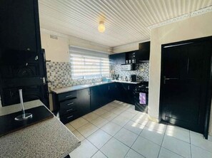 Microwave, oven, stovetop, dishwasher - Cozy 4-bedroom home in a quiet Bulawayo neighborhood 15 minutes from city noise. (Nkulumani)