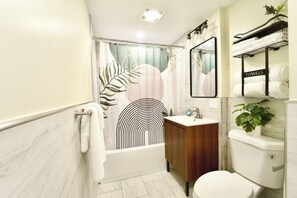 Hair dryer, towels, soap, toilet paper