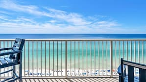 A balcony with a view of a beach and ocean. - Majestic Beach Towers 2-1608 (Panama City Beach)