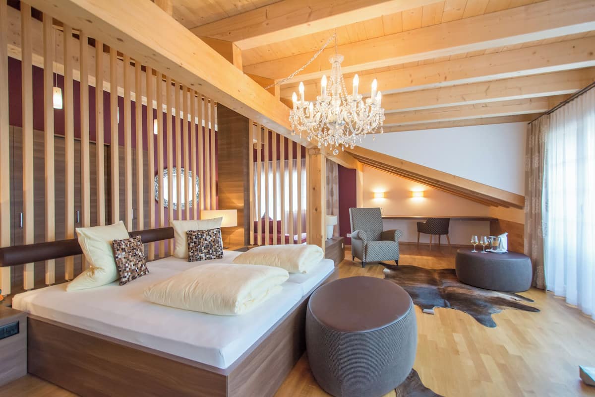 Deluxe Suite, Balcony, Mountain View | In-room safe, desk, WiFi (free), bed sheets