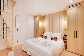 شقة | 3 عدّة غرف نوم ومساحة عمل للكمبيوتر المحمول ومكواة/لوح كي وملاءات أسرّة