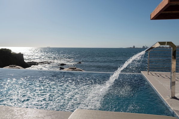 Outdoor pool, pool umbrellas, pool loungers