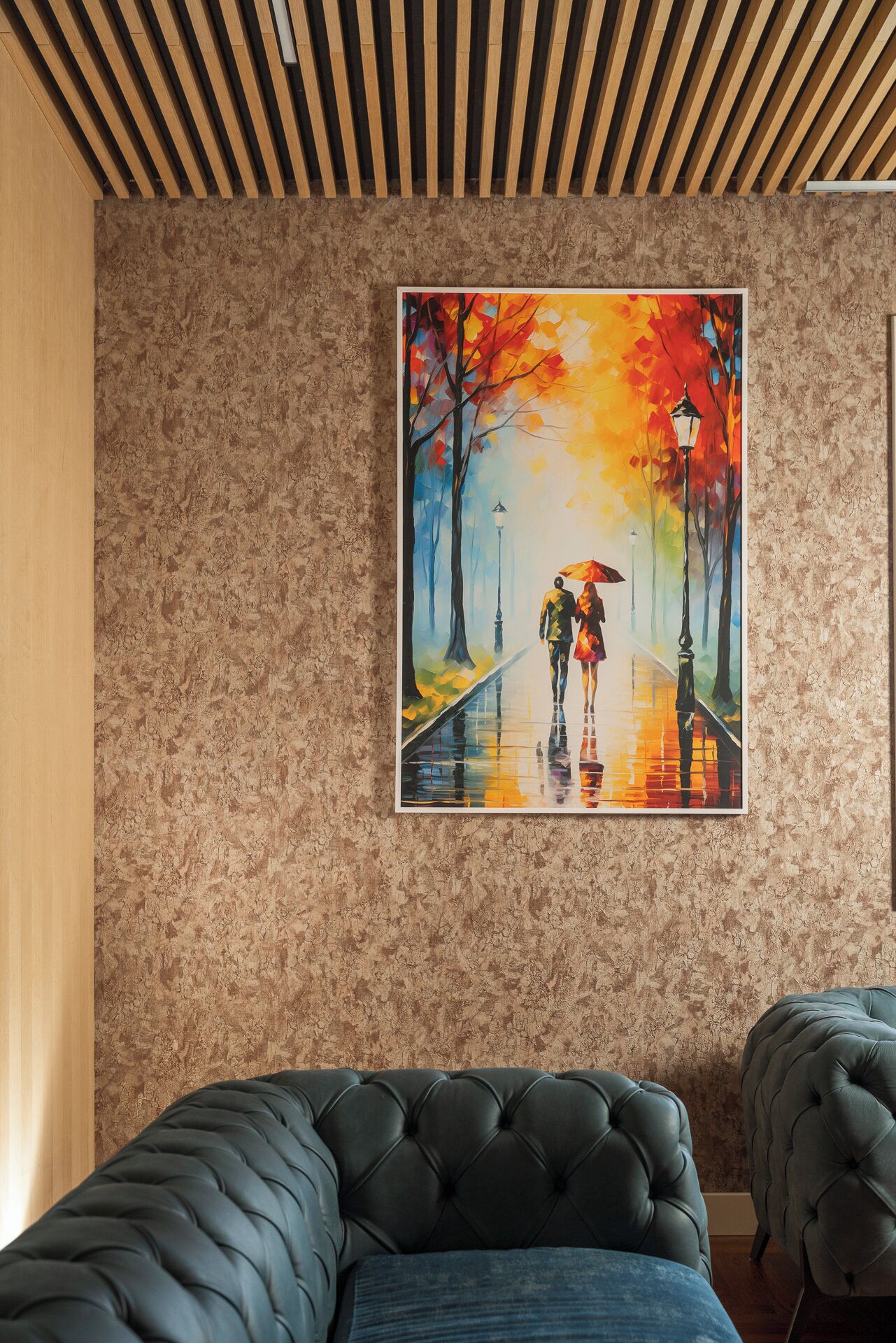 A bedroom with a bed, a painting of a couple walking on a rainy street, and a wooden ceiling.