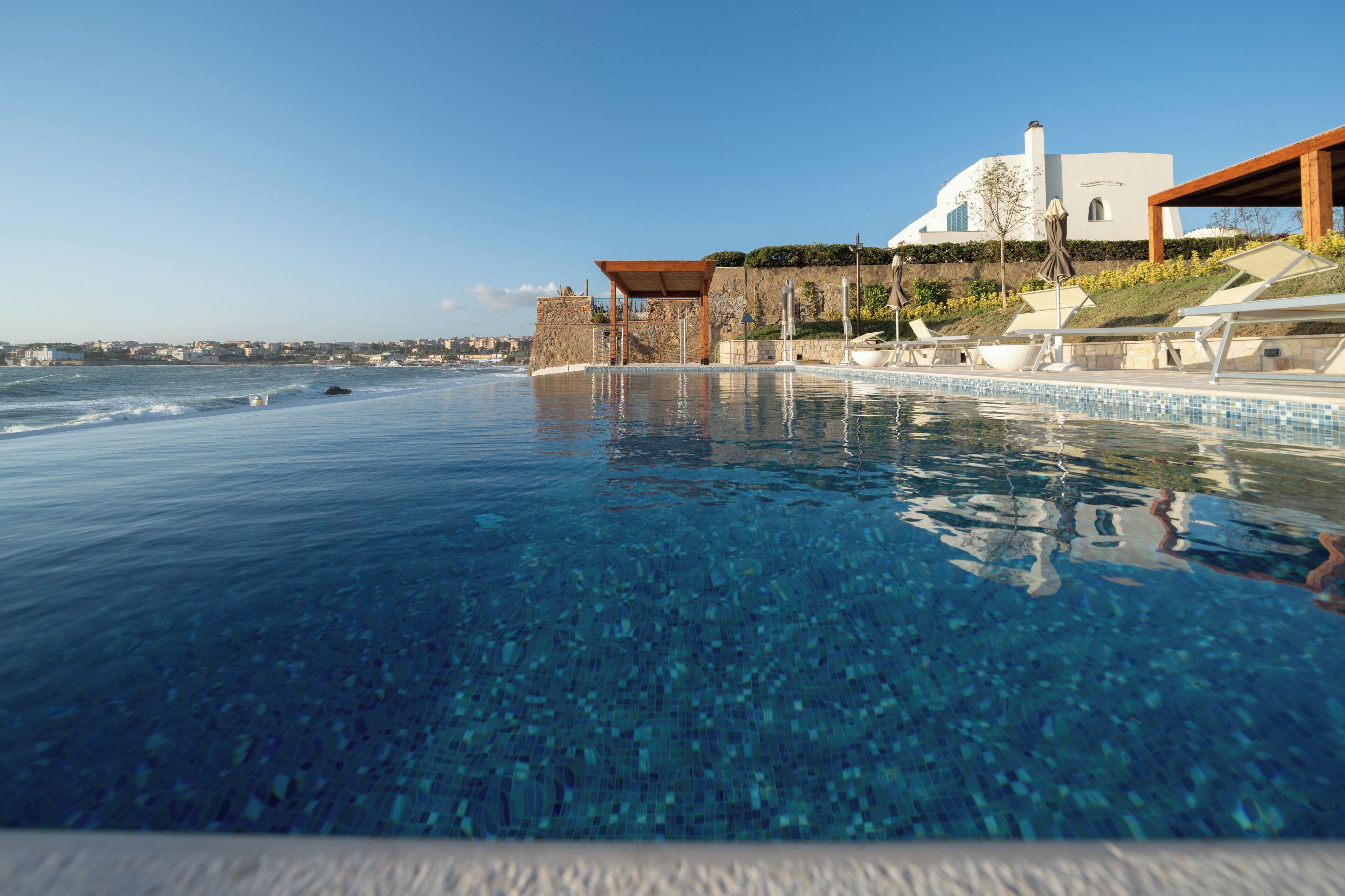 Outdoor pool, pool umbrellas, sun loungers