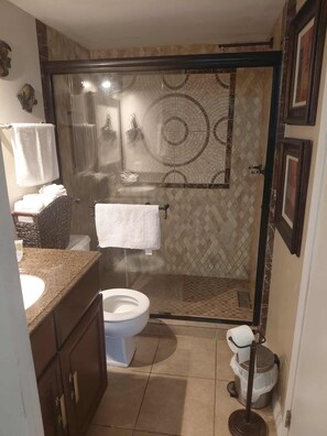 Shower, hair dryer, towels, soap