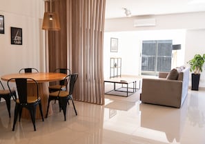 Premium Suite, City View | Living area | 32-inch LED TV with cable channels